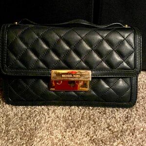 Black Michael Kors crossbody bag.